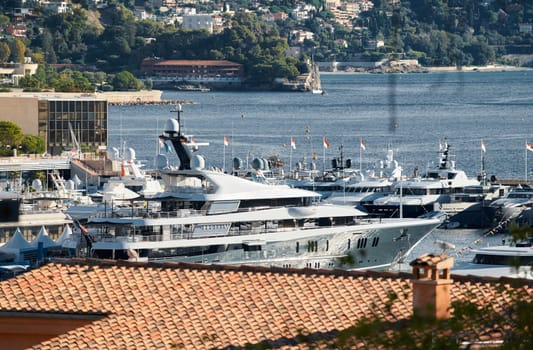 Monaco, Monte Carlo, 01 October 2022 - The famous motorboat exhibition at morning, mega yacht show, novelties of the boating industry. High quality photo