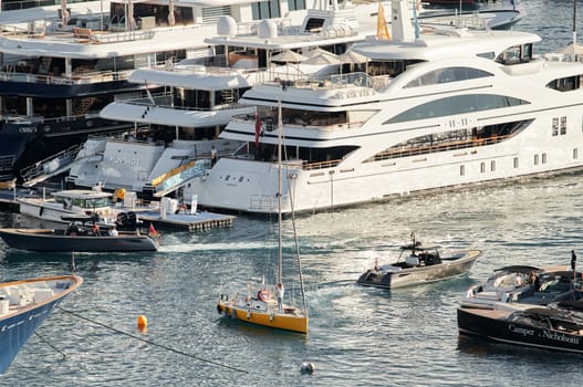 Monaco, Monte Carlo, 01 October 2022 - The famous motorboat exhibition at morning, mega yacht show, novelties of the boating industry. High quality photo