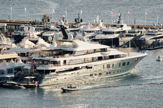 Monaco, Monte Carlo, 01 October 2022 - The famous motorboat exhibition at morning, mega yacht show, novelties of the boating industry. High quality photo