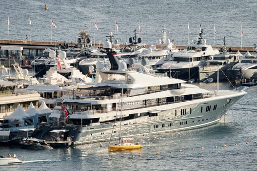 Monaco, Monte Carlo, 01 October 2022 - The famous motorboat exhibition at morning, mega yacht show, novelties of the boating industry. High quality photo