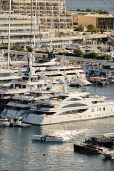 Monaco, Monte Carlo, 01 October 2022 - The famous motorboat exhibition at morning, mega yacht show, novelties of the boating industry. High quality photo