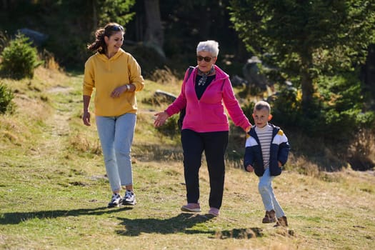 A family shares delightful moments with their friends amid the stunning landscapes of mountains, lakes, and winding paths, promoting a healthy lifestyle and the joy of familial bonds in the embrace of nature's beauty.