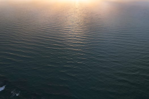 Aerial photographic documentation of a sunset over the Mediterranean sea 