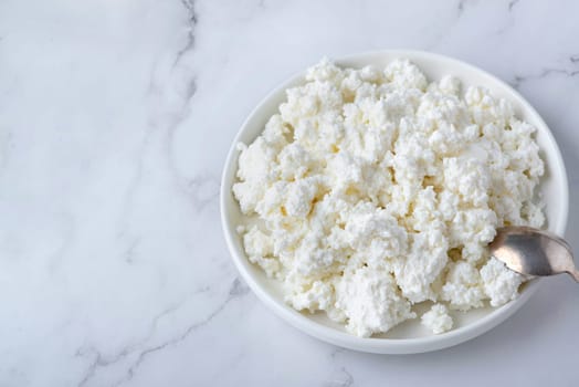 Bowl of cottage cheese from above.