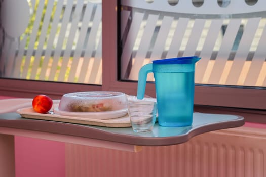 Food on a mobile tray in a modern hospital ward