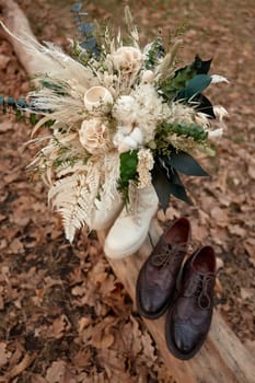 bride and groom shoes, wedding bouquet outdoor. wedding concept