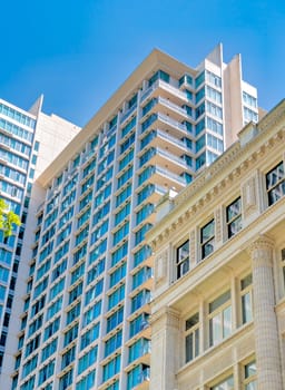 Architecture of historic and modern buildings in downtown of Vancouver, Canada.