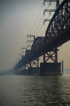 Hardinge Bridge in fog steel railway truss bridge over the Padma River, Bangladesh