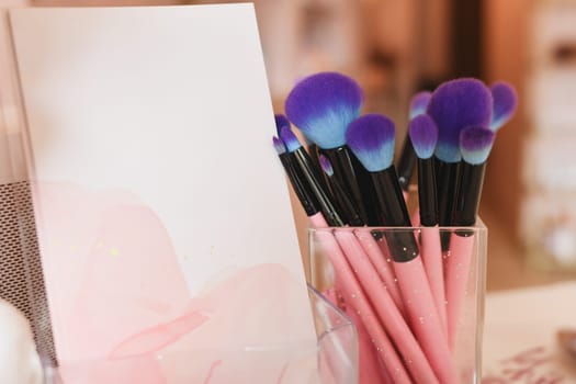Makeup artist brushes for professional makeup in beauty salon