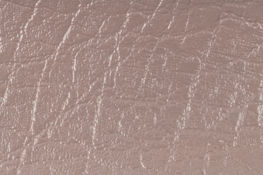 Closeup of detailed brown leather texture background.