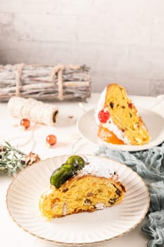 Bolo do Rei or King's Cake, Made for Christmas, Carnavale or Mardi Gras with Christmas season elements in Background.