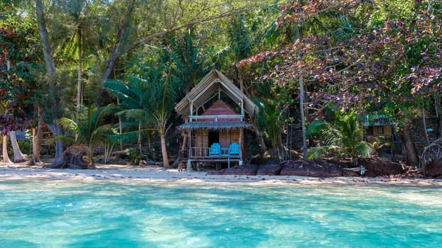 Koh Wai Island Trat Thailand is a tinny tropical Island near Koh Chang. wooden bamboo hut bungalow on the beach on a sunny day