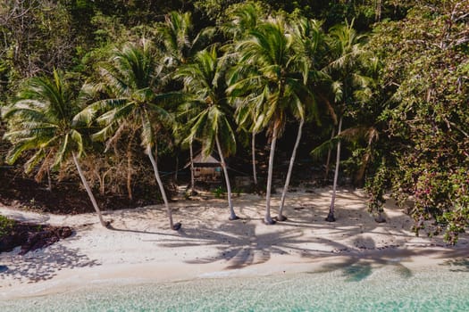 Koh Wai Island Trat Thailand is a tinny tropical Island near Koh Chang. wooden bamboo hut bungalow on the beach