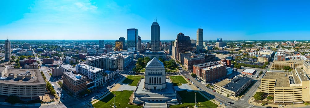 Sunny Panoramic Aerial View of Indianapolis Skyline, Downtown and Indiana War Memorial, Captured by Drone