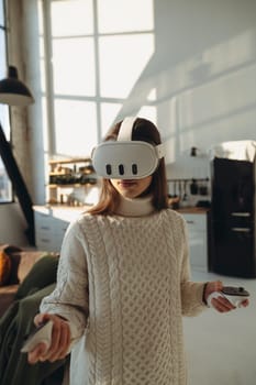 Sharing her thoughts, a stunning girl in a virtual reality headset discusses her impressions. High quality photo
