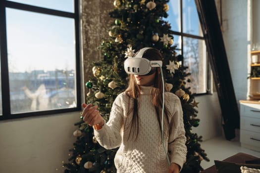 A captivating portrait of a girl adorned with a VR headset, framed by a Christmas tree. High quality photo