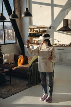 A young woman, immersed in an online game, wears a virtual reality headset at home. High quality photo
