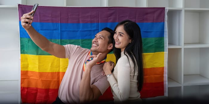 Attractive cheerful gay man enjoy while selfie with female friend.