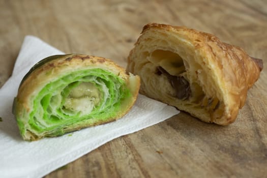 pistachio and chocolate croissant half cut