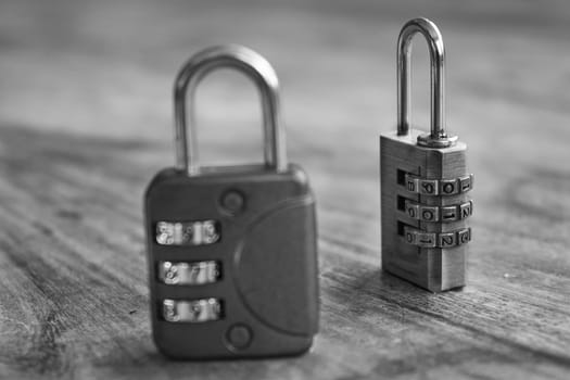 concept of safety  with two combination lock on a wooden table