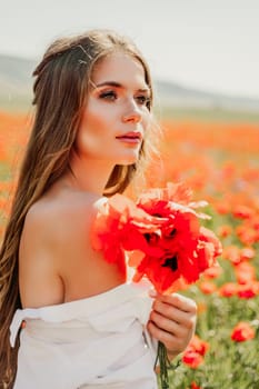 Woman poppies field. Side view of a happy woman with long hair in a poppy field and enjoying the beauty of nature in a warm summer day