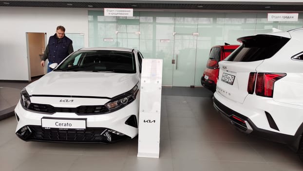 Cheboksary, Russia - March 20, 2023: Cars in showroom of dealership KIA