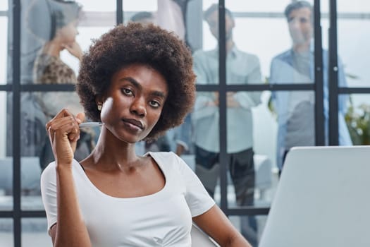 Portrait of a young business woman in an modern office