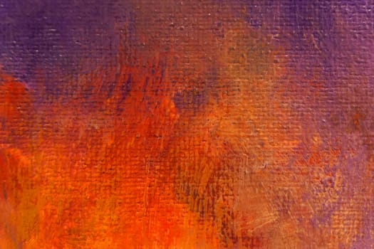 Bright texture of canvas painted in orange-yellow-violet colors with shades. Abstract background