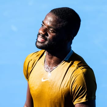 MELBOURNE, AUSTRALIA - JANUARY 10: Frances Tiafoe of USA reacts whilst playing against Zhang Zhi Zhen of China during day one of the 2024 Kooyong Classic at Kooyong on January 10, 2024 in Melbourne, Australia.