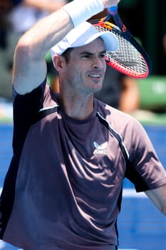 MELBOURNE, AUSTRALIA - JANUARY 11: Sir Andy Murray of Great Britian in action against Marin Cilic of Croatia during day one of the 2024 Kooyong Classic at Kooyong on January 11, 2024 in Melbourne, Australia.