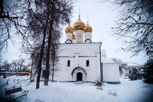 Entrance to the church on the territory of the ancient Solotchinsky monastery on a cold winter day