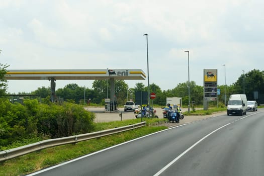 Parma, Italy - June 14, 2023: Eni gas station of the Italian oil company next to the road.