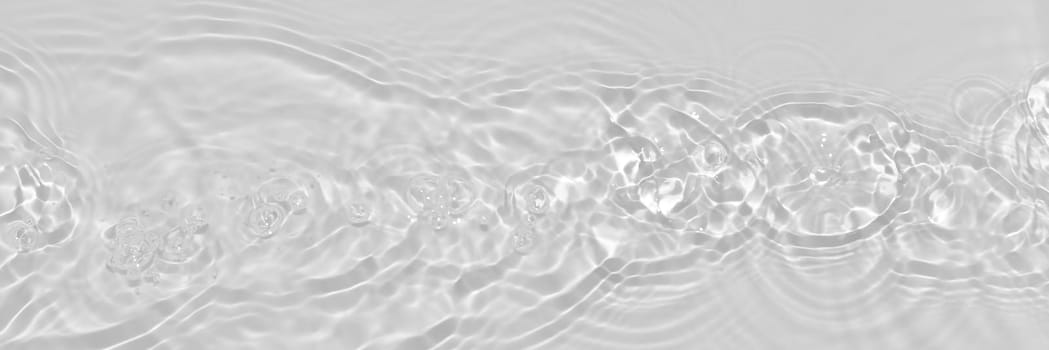 Water texture with sun reflections on the water overlay effect for photo or mockup. Organic light gray drop shadow caustic effect with wave refraction of light. Long Banner with copy space.