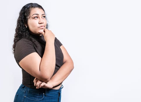 Thoughtful people with hand on chin. Latin girl wondering with hand on chin isolated