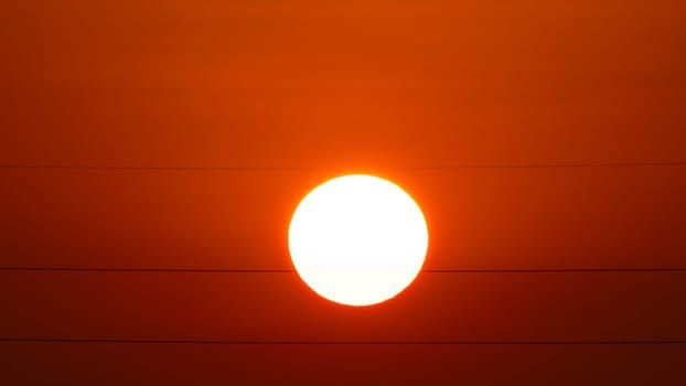 Beautiful nature morning with orange, yellow sunshine and fluffy clouds. Time lapse of clouds and sunrise.