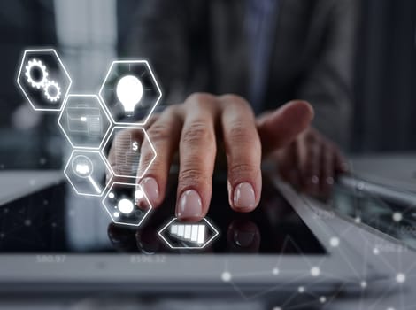 businessman pressing his finger on the screen of the digital tab