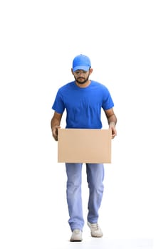 A male deliveryman, on a white background, in full height, puts a box.