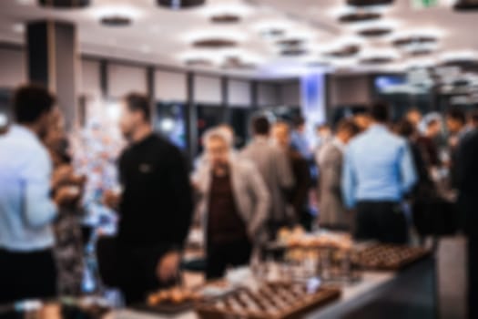 Blurred image of businesspeople at banquet event business meeting event. Business and entrepreneurship events concept.