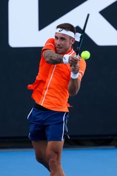 MELBOURNE, AUSTRALIA - JANUARY 11: Alex Molčan of Slovakia on his way to beating John Millman of Australia in qualifying ahead of the 2024 Australian Open at Melbourne Park on January 11, 2024 in Melbourne, Australia.