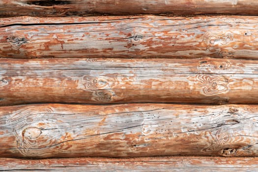 House wall in the village. Russian masonry of logs in the southern Urals