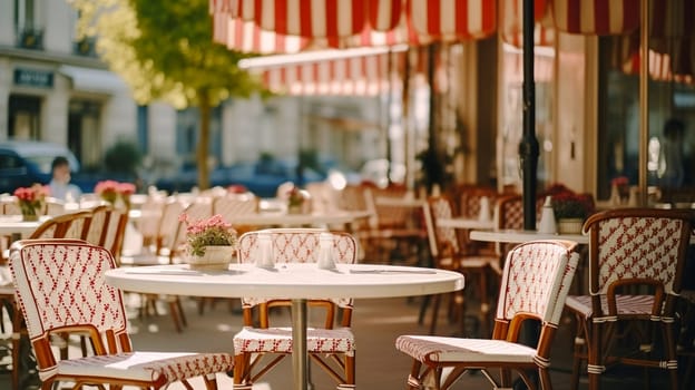 A serene Parisian cafe setup with wicker chairs and tables on a sidewalk, awaiting guests