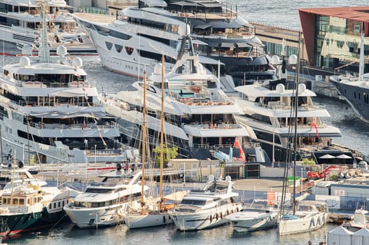 Monaco, Monte Carlo, 01 October 2022 - The famous motorboat exhibition at morning, mega yacht show, novelties of the boating industry. High quality photo