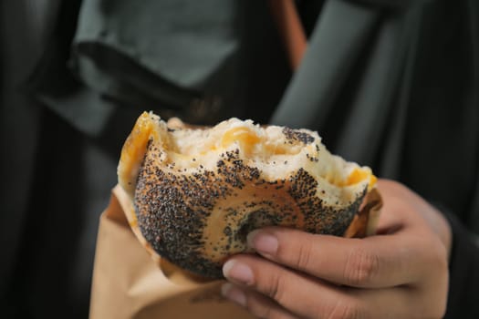 women hand holding beef burger .