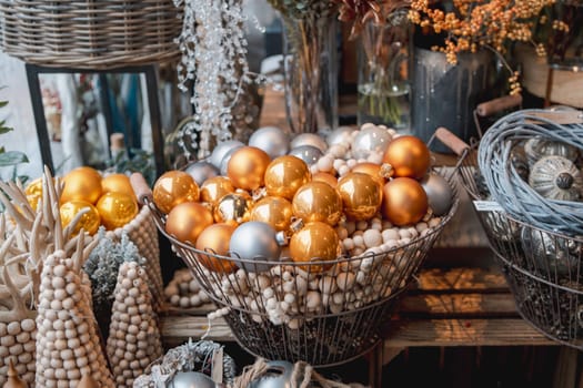 Diverse New Year ornaments fill the shelves of the decor shop. High quality photo