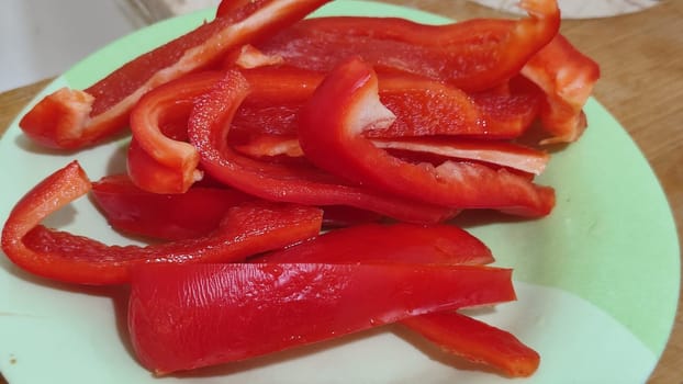 fresh cut red bell pepper, salad food, vegetarianism. High quality photo