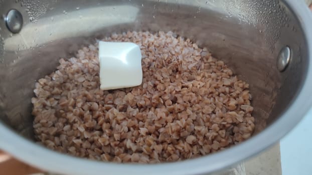 buckwheat, buckwheat porridge with butter, food. background, cooking. High quality photo