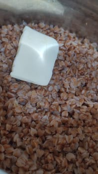 buckwheat, buckwheat porridge with butter, food. background, cooking. High quality photo