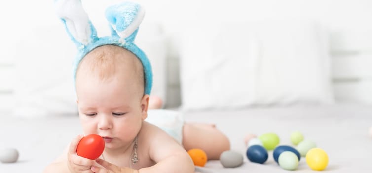 Cute little boy with bunny ears, Easter.