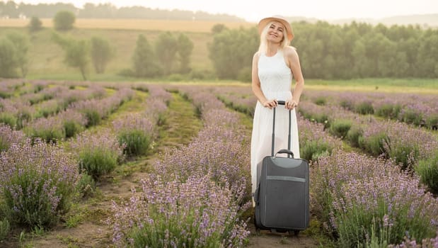 woman with bag in lavender field