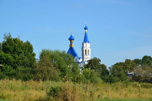 Rural landscape with Church of St. Dmitry Solunsky in village Korobovka